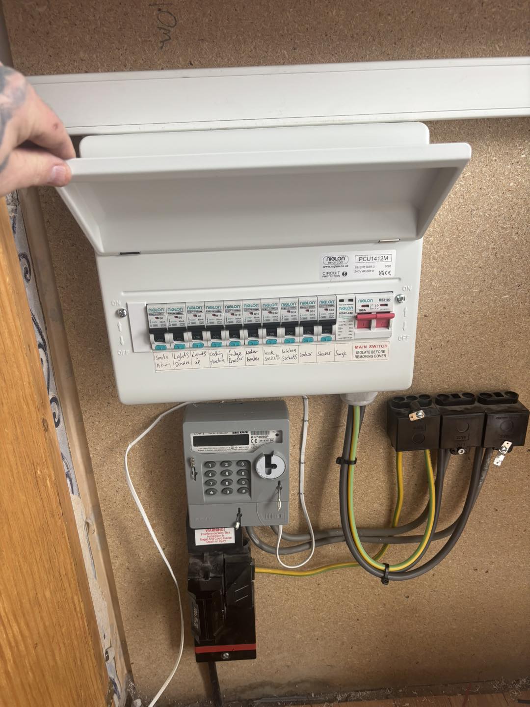 Man opening a fuse in Carrickfergus, County Antrim