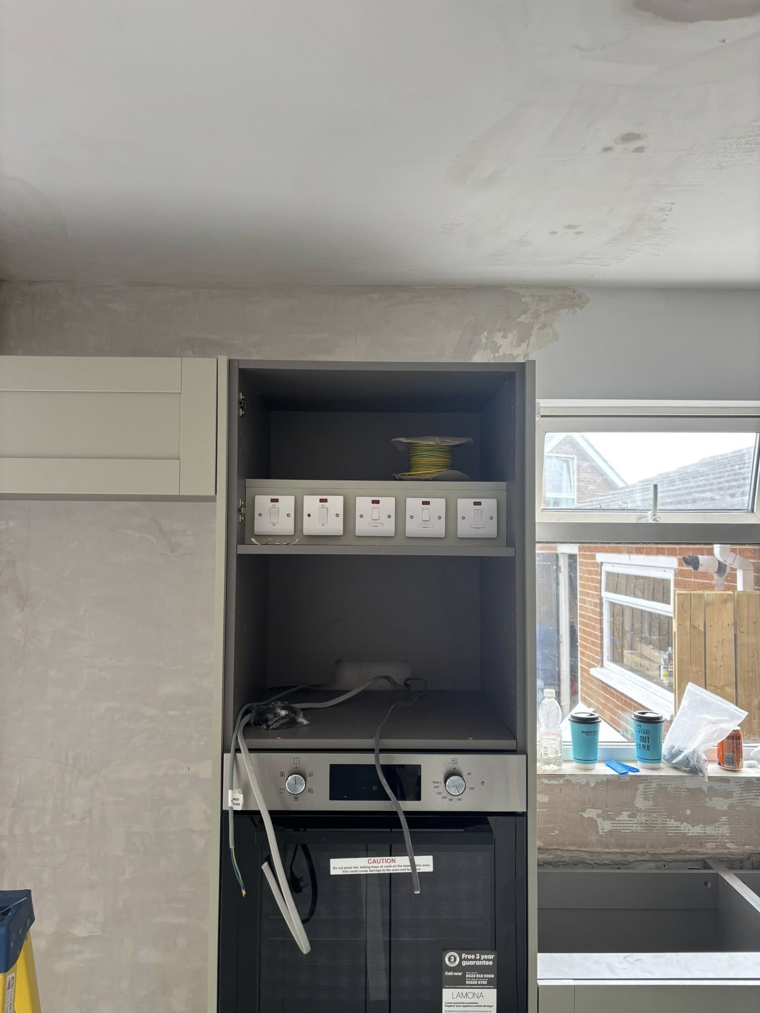 5 plugs installed on top of cooker in Carrickfergus, County Antrim